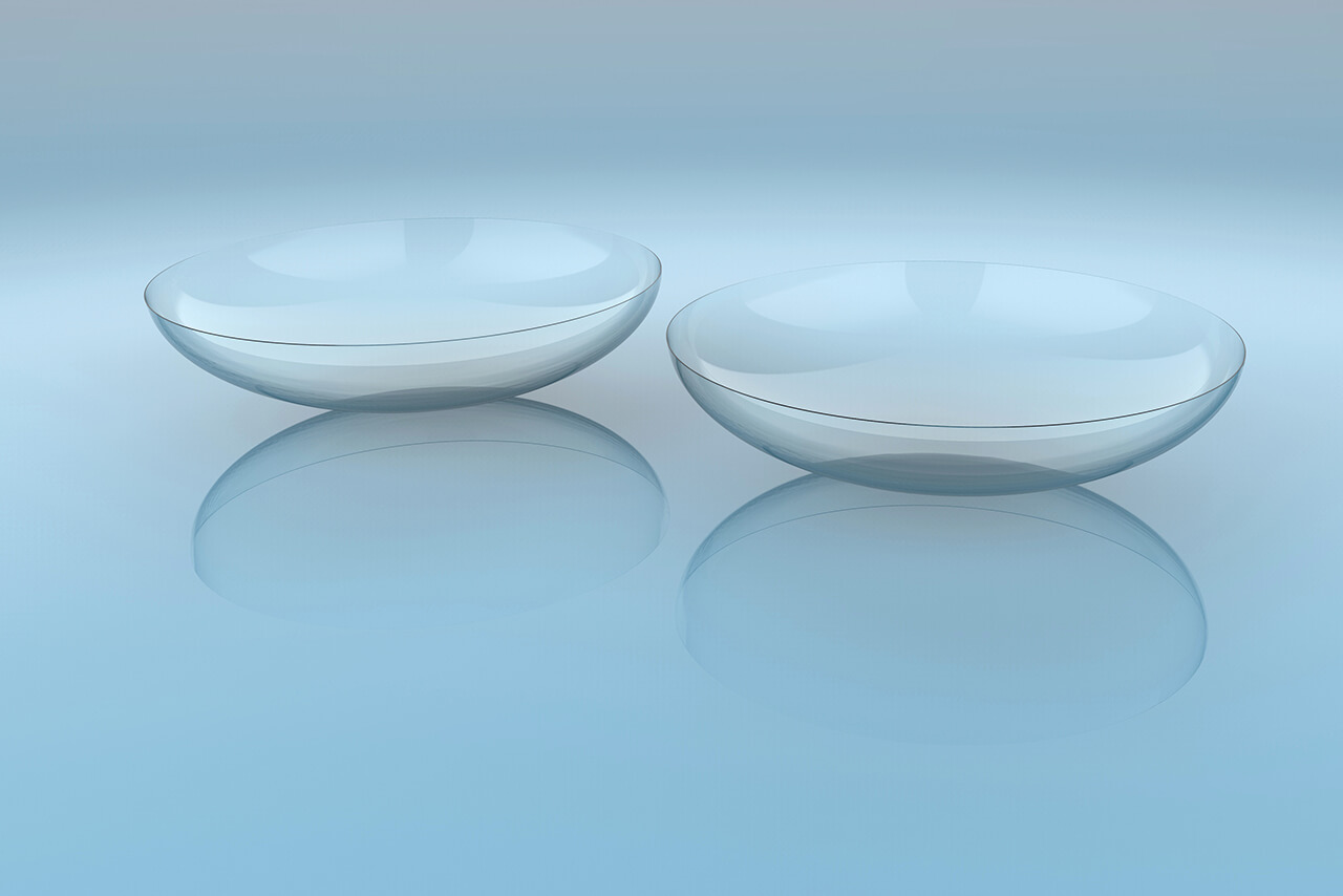 Ultra-thin sandwich layer pigment encapsulation contact lens